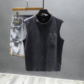 A white loose-fit cotton sleeveless t-shirt with a straight hem, laid flat.