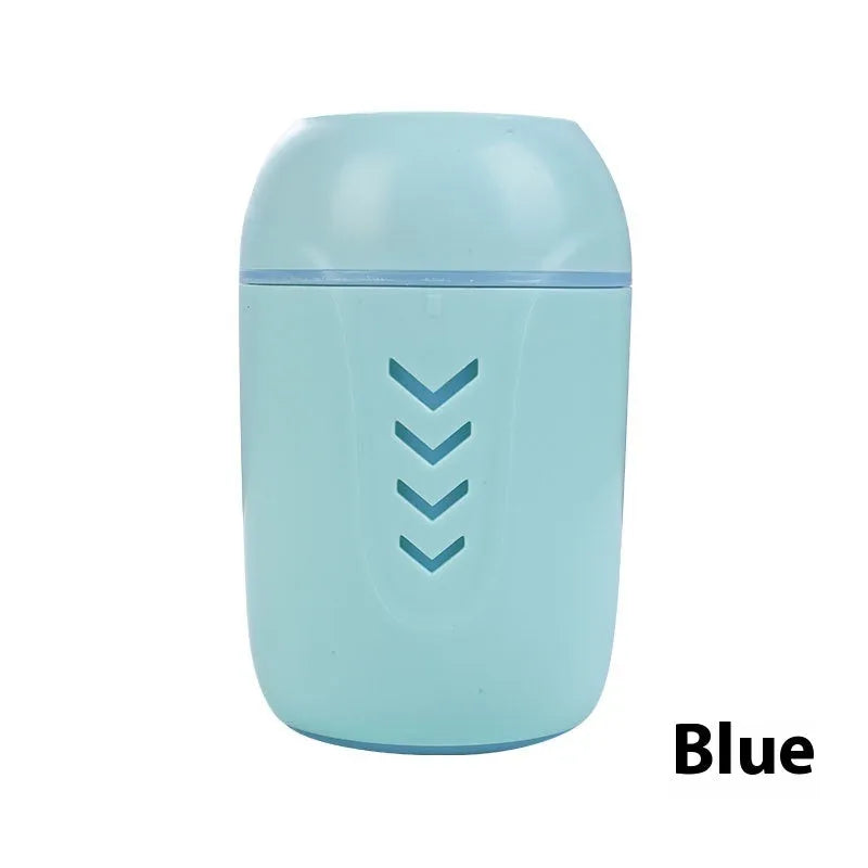 Round desktop air purifier with aromatherapy in blue, showing single fog outlet and USB cable