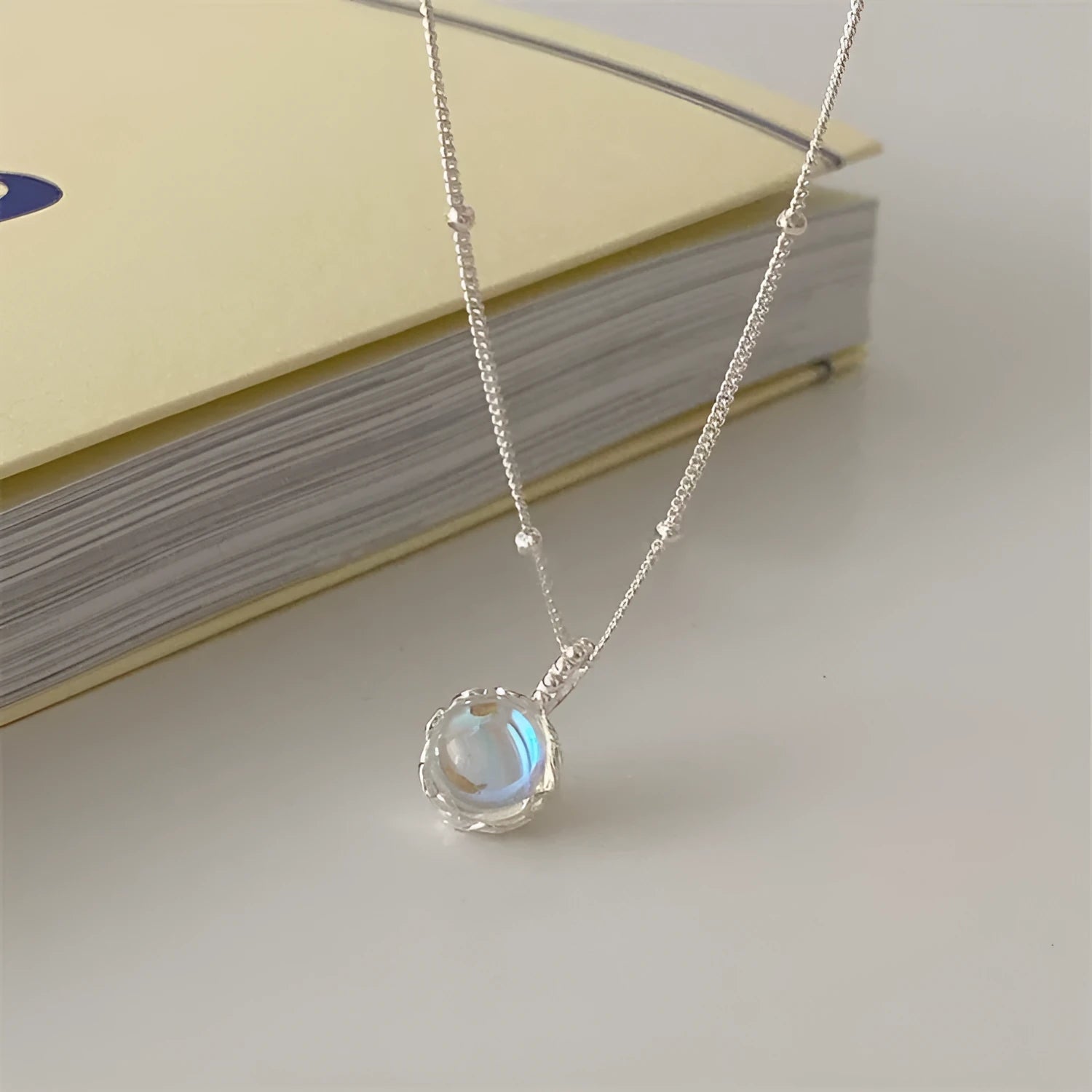 Women's silver geometric pendant necklace with adjustable curb chain in 925 sterling silver