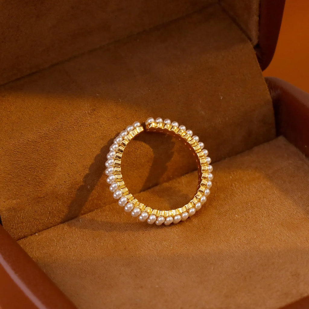 Gold electroplated geometric women's ring with adjustable open mouth design and round elements