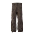 Men's brown loose straight-leg cotton trousers with a high waist and zipper fly.