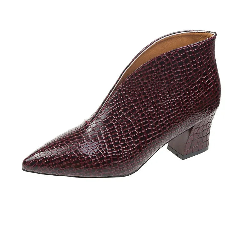 Women's V cut pointed embossed chunky heel Martin boots in artificial PU, black colour, low tube length