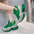 Women's leather sports shoes with thick jelly-style sole and cross-tie laces in multiple colours.