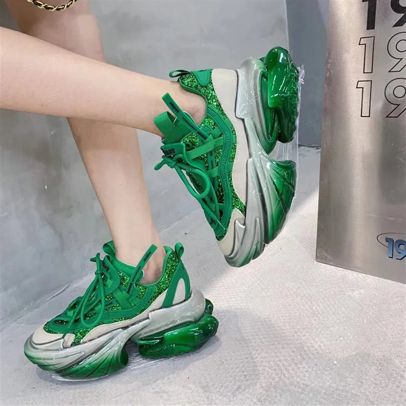 Women's leather sports shoes with thick jelly-style sole and cross-tie laces in multiple colours.