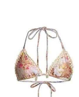 Women's creamy white floral bikini set with briefs and skirt on nylon fabric