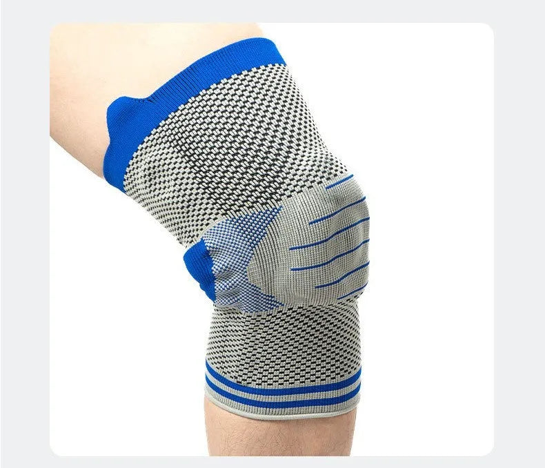 Cotton knee pad with silicone shock absorber spring bar in grey and blue colour, shown from the side.