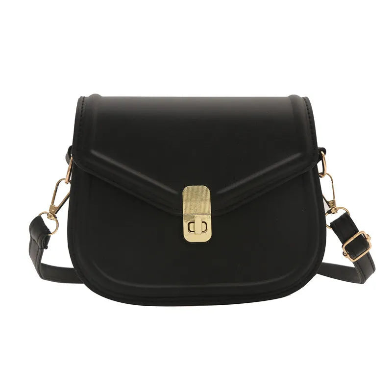 Soft PU leather clamshell shoulder messenger bag in horizontal square shape.