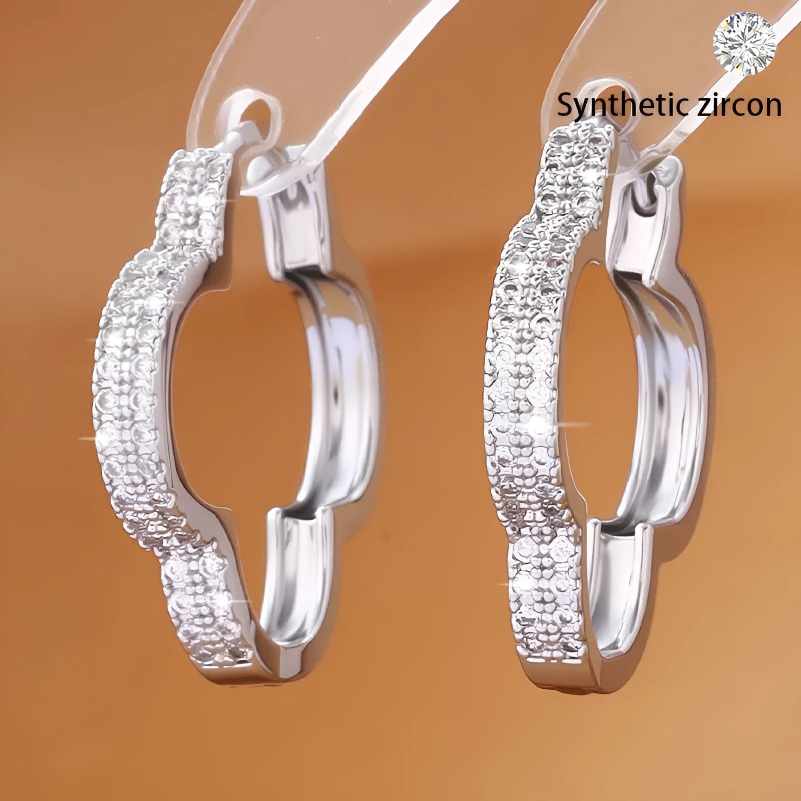 Heart-shaped earrings with micro-inlaid zirconia in gold copper finish for women