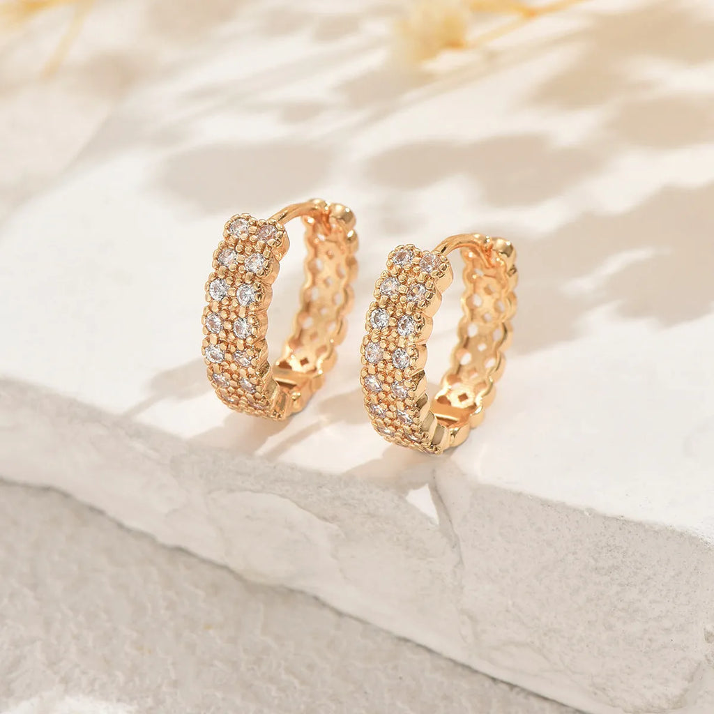 Copper geometric ear studs with circular dot and ring patterns in European American style