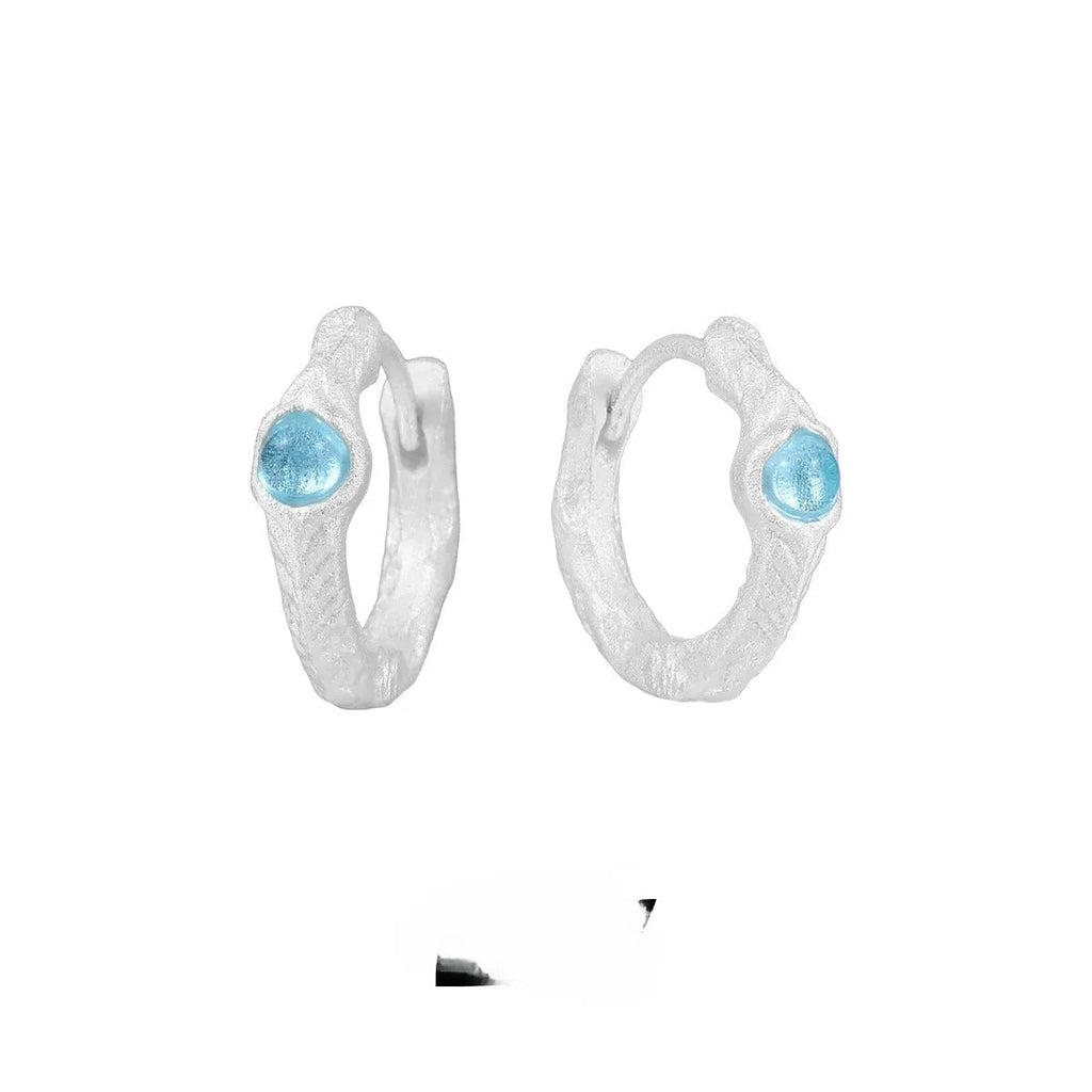 925 silver geometric ear clip with burnt silver electroplated finish and round design elements