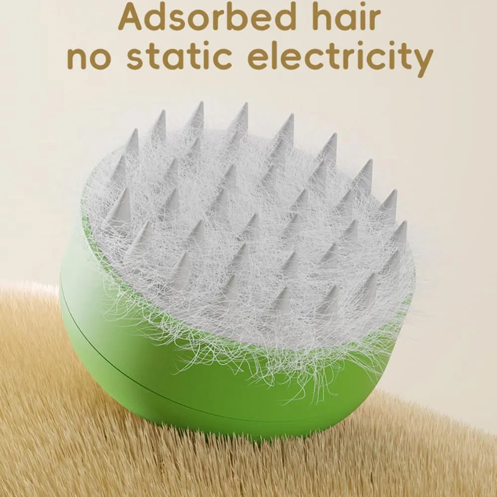 Green and yellow rechargeable silicone cat steam brush for grooming and massage.