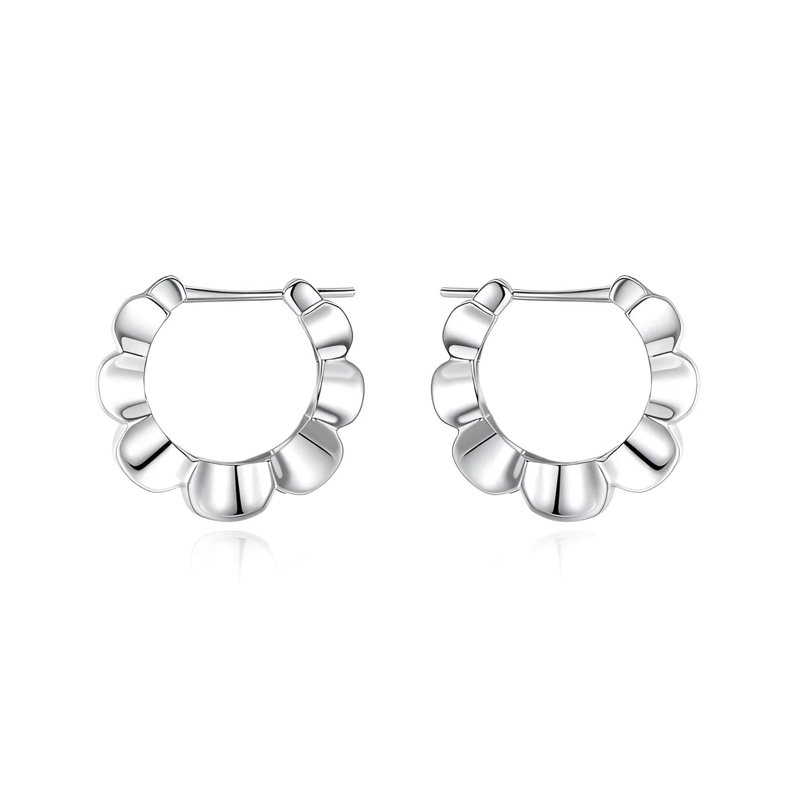 A pair of sterling silver geometric earrings with round details in a retro style.