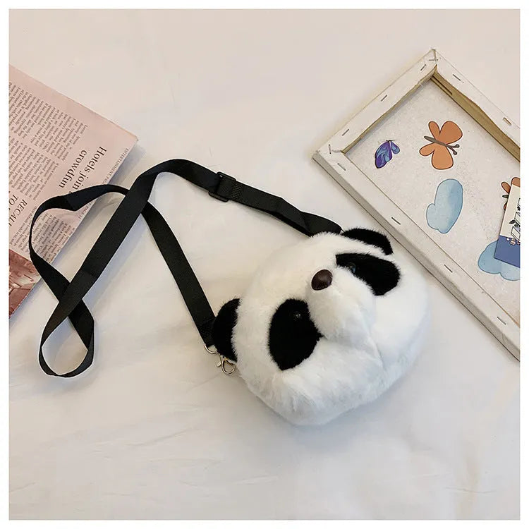 Plush panda head design cylindrical crossbody bag measuring 18cm wide