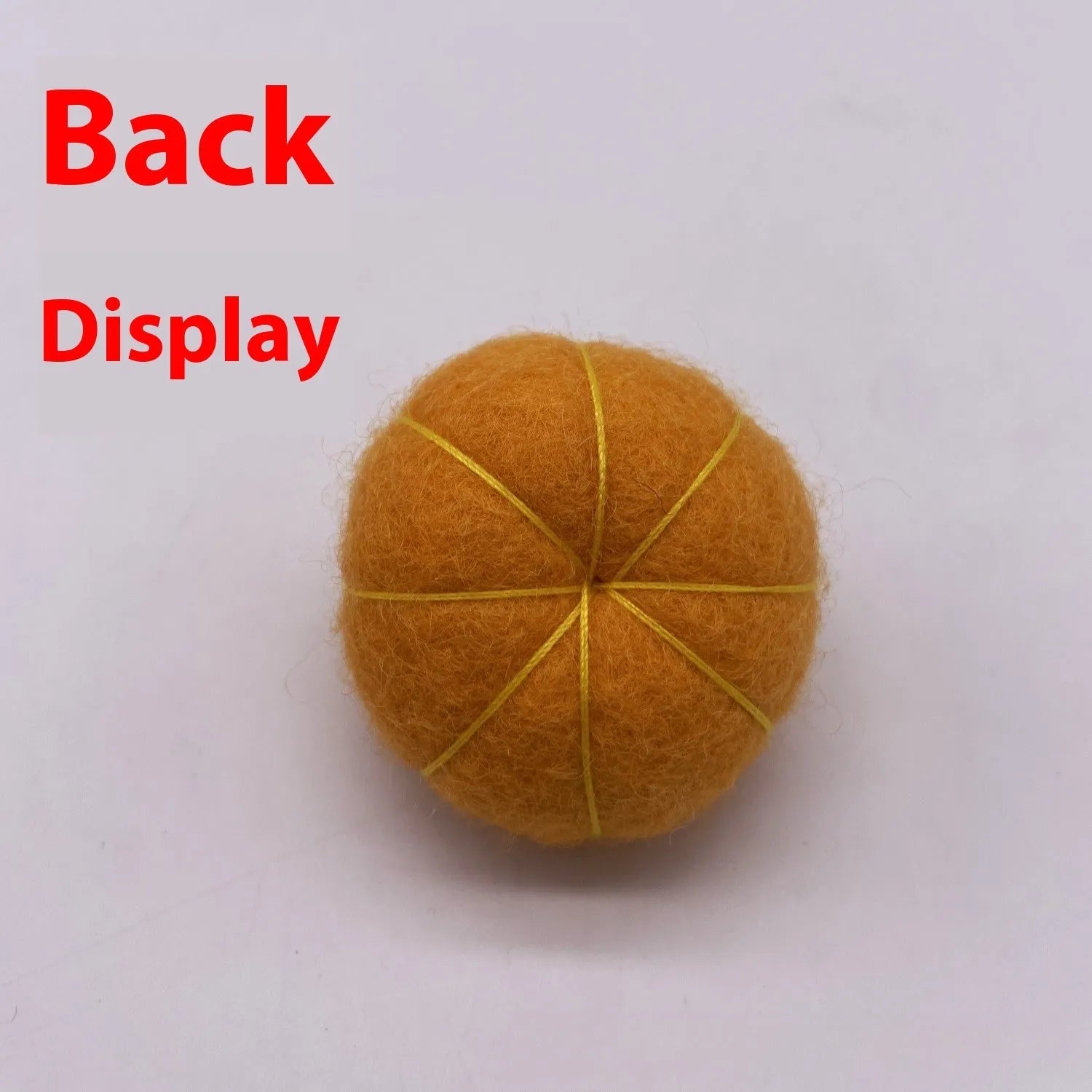 Wool felt pumpkin poke ornament in orange, approximately 5cm diameter and 4.5cm height, for doll decoration