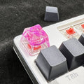 Transparent resin mechanical keyboard keycap showing starry sky galaxy design in multiple colour options