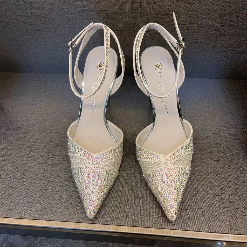 Women's hollow high heels with red sole, pointed toe stiletto design in black and silver colour options