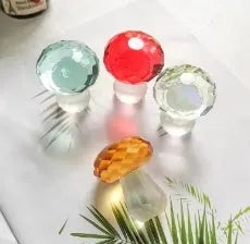 Colourful crystal mushroom decoration in geometric style measuring 40mm by 53mm