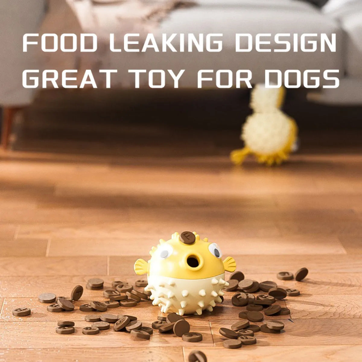 Yellow fish-shaped vinyl dog chew toy with textured surface and squeaker for aggressive chewers