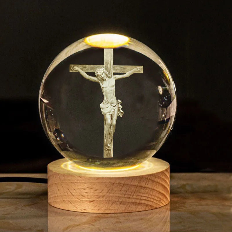 White crystal ball ornament with solid wood warm light base on desk surface