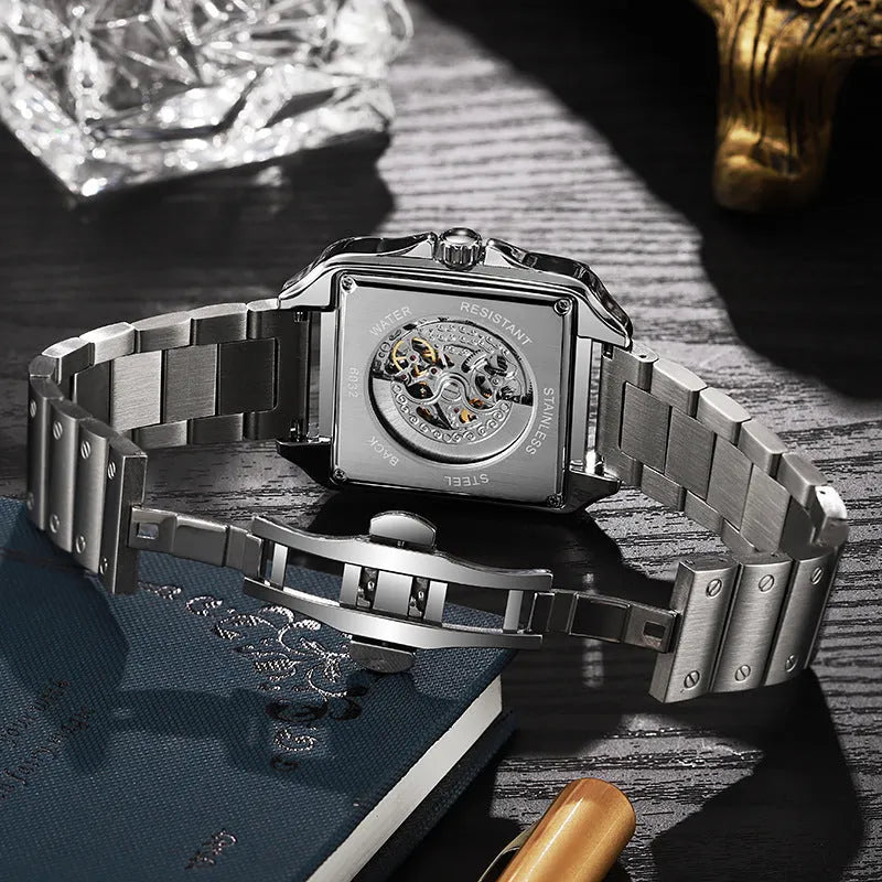 Men's square automatic watch with diamond-studded bezel on a black leather strap