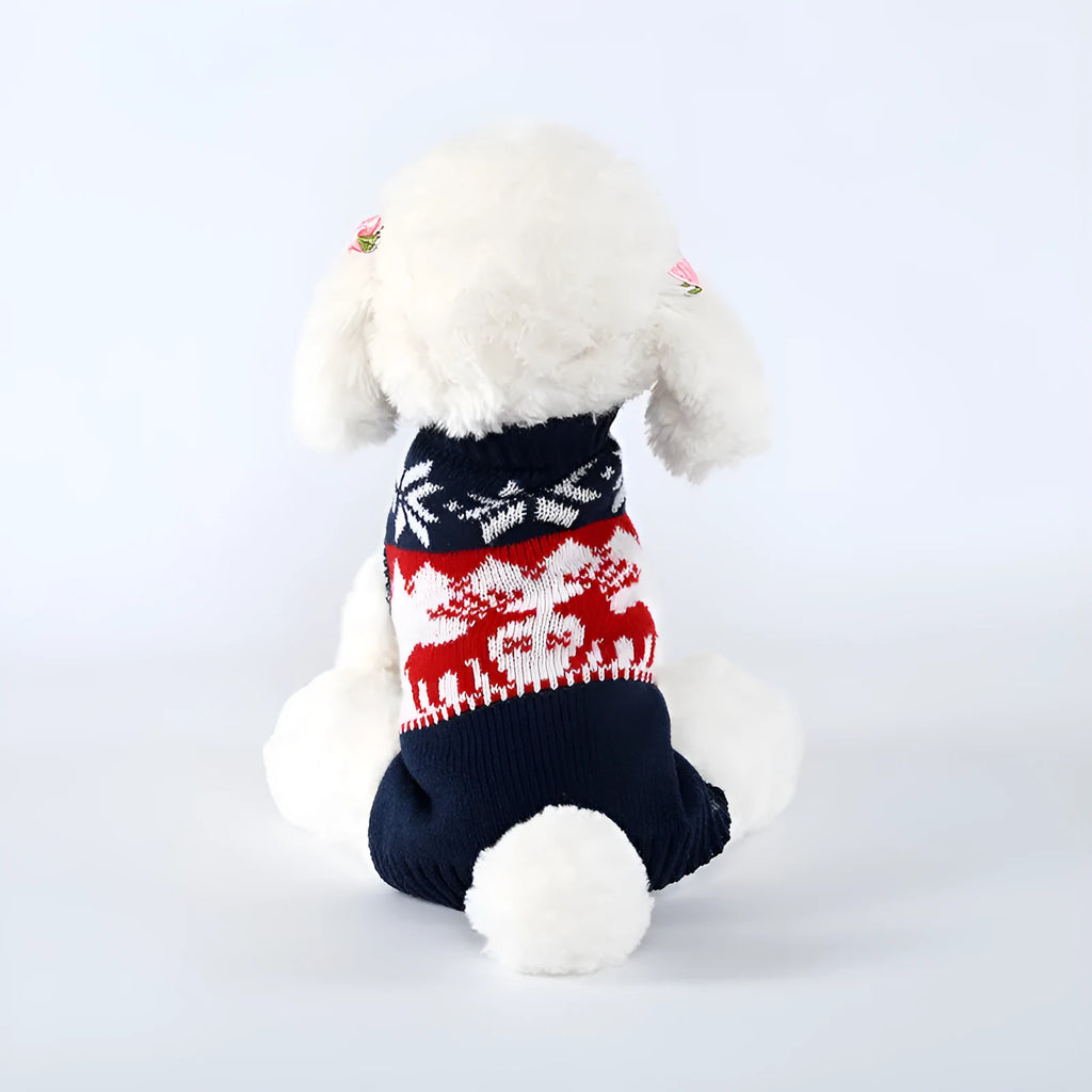 Navy blue knitted Christmas sweater for a dog on a hanger.