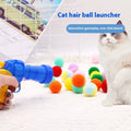 Colourful plush pet toy gun launching soft yarn balls for dogs to fetch