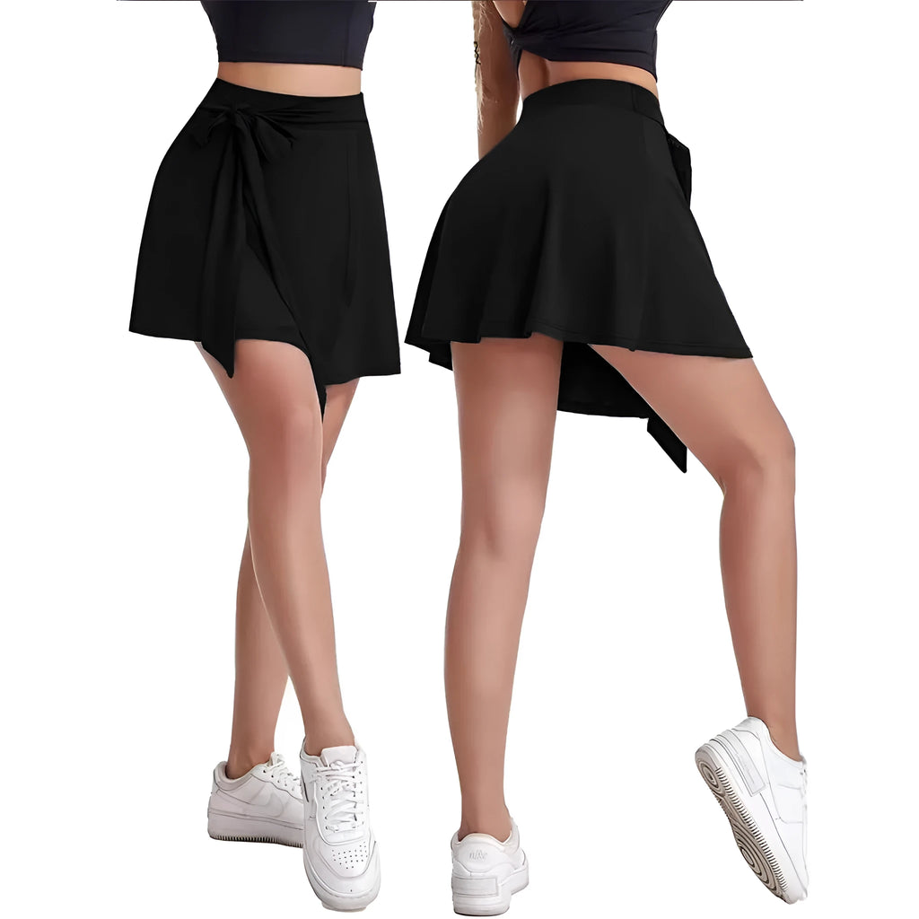 Black thigh-length sports skirt with built-in shorts, high waist, and shoulder strap design