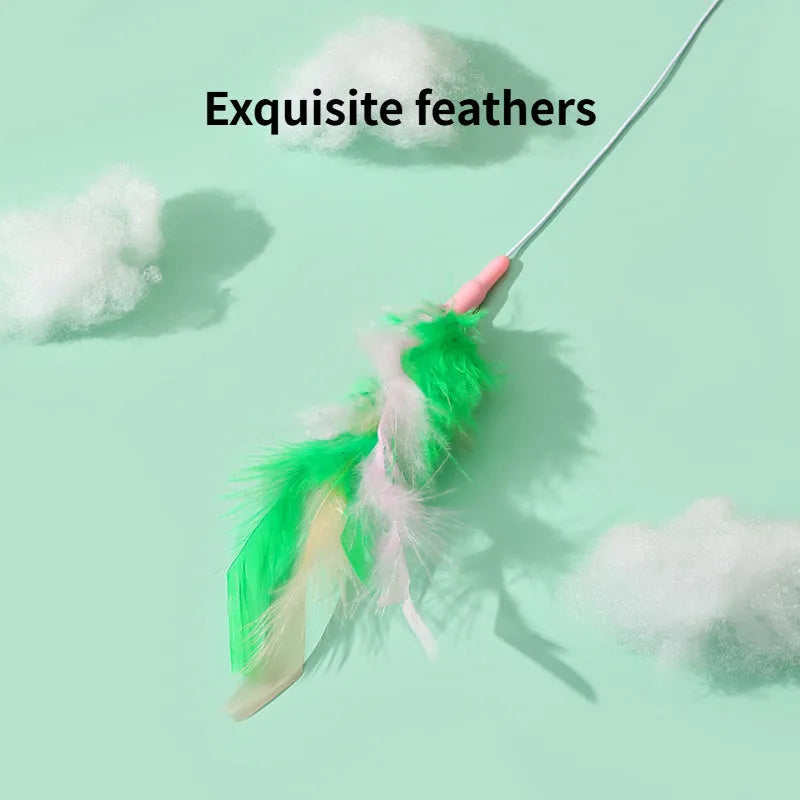 Green interactive cat feather wand toy with bells on a light background