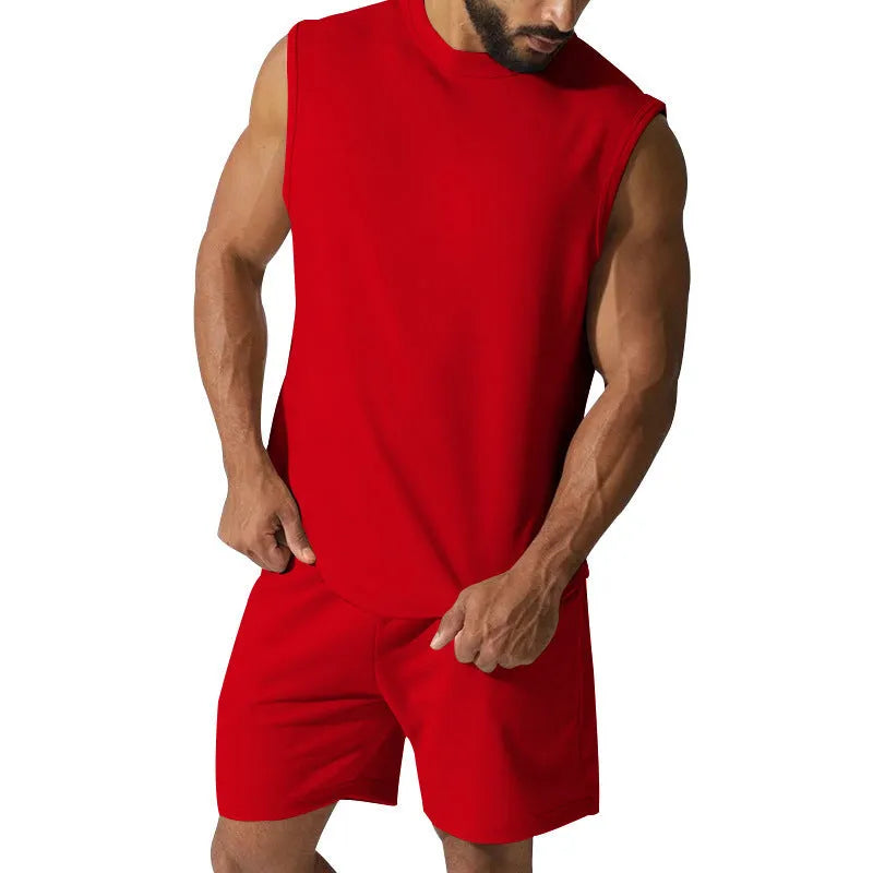 Men's sleeveless cotton blend sports top and shorts set in a solid colour on a mannequin.