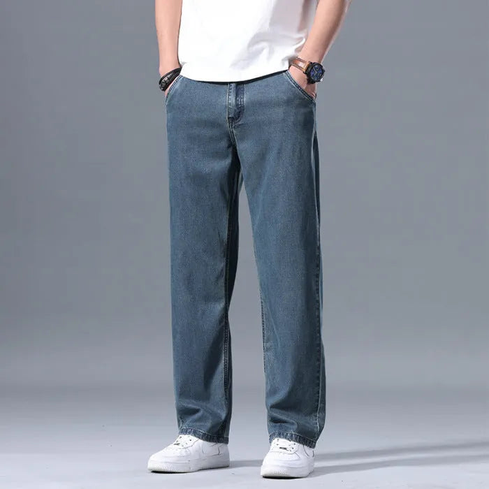 Men's lyocell loose straight-leg casual jeans in light blue with zipper fly, size 30