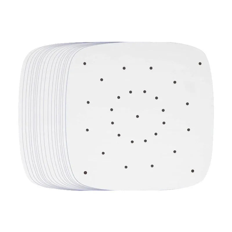 Stack of oiled paper square baking sheets with holes for air fryer use natural colour 20cm