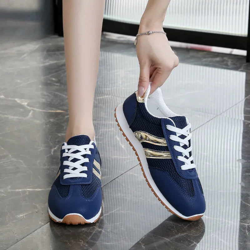 Blue women's casual tennis shoes with cross shoulder straps, round toe, and non-slip rubber soles
