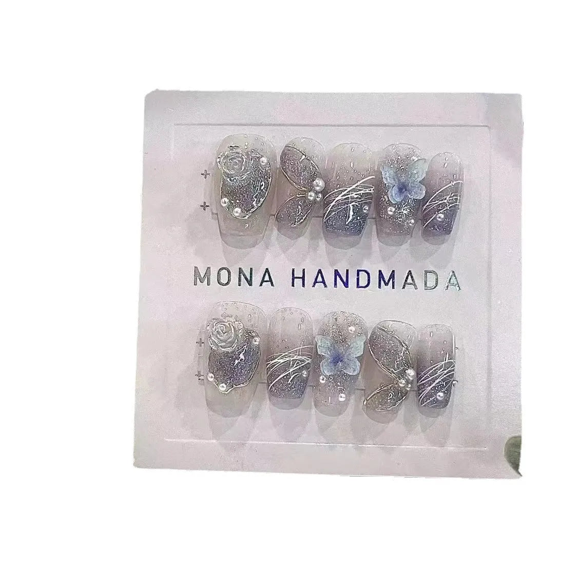 Hand-wearing bridal fake nails sequins set in four sizes with glue and tools for nail art