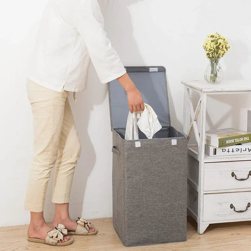 Foldable cotton linen storage basket in a neutral colour, shown in its three-dimensional form ready for use.