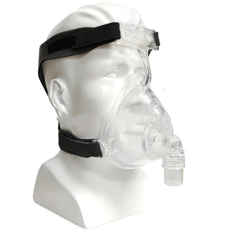Transparent CPAP breathing mask with headband and dual elbow adapters for ventilator connection