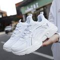 White women's thick-soled casual sports shoes with mesh upper and buckle detail