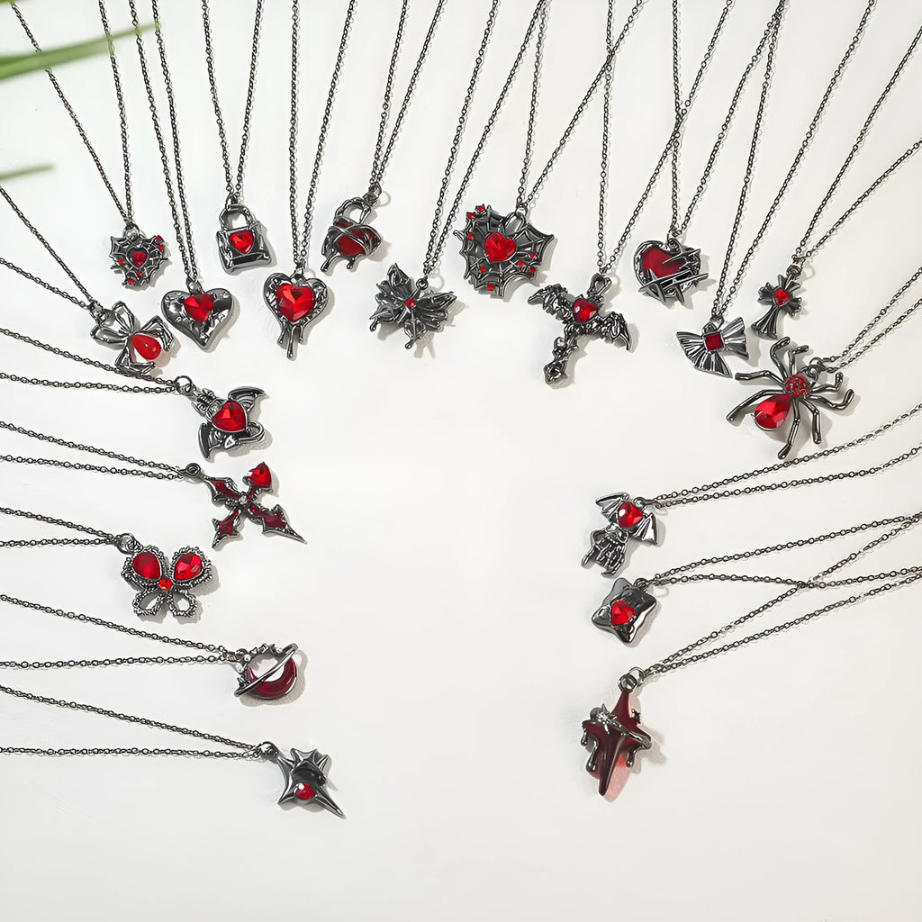 Halloween necklace with spider, bat, and skull wing charms on a zinc alloy chain