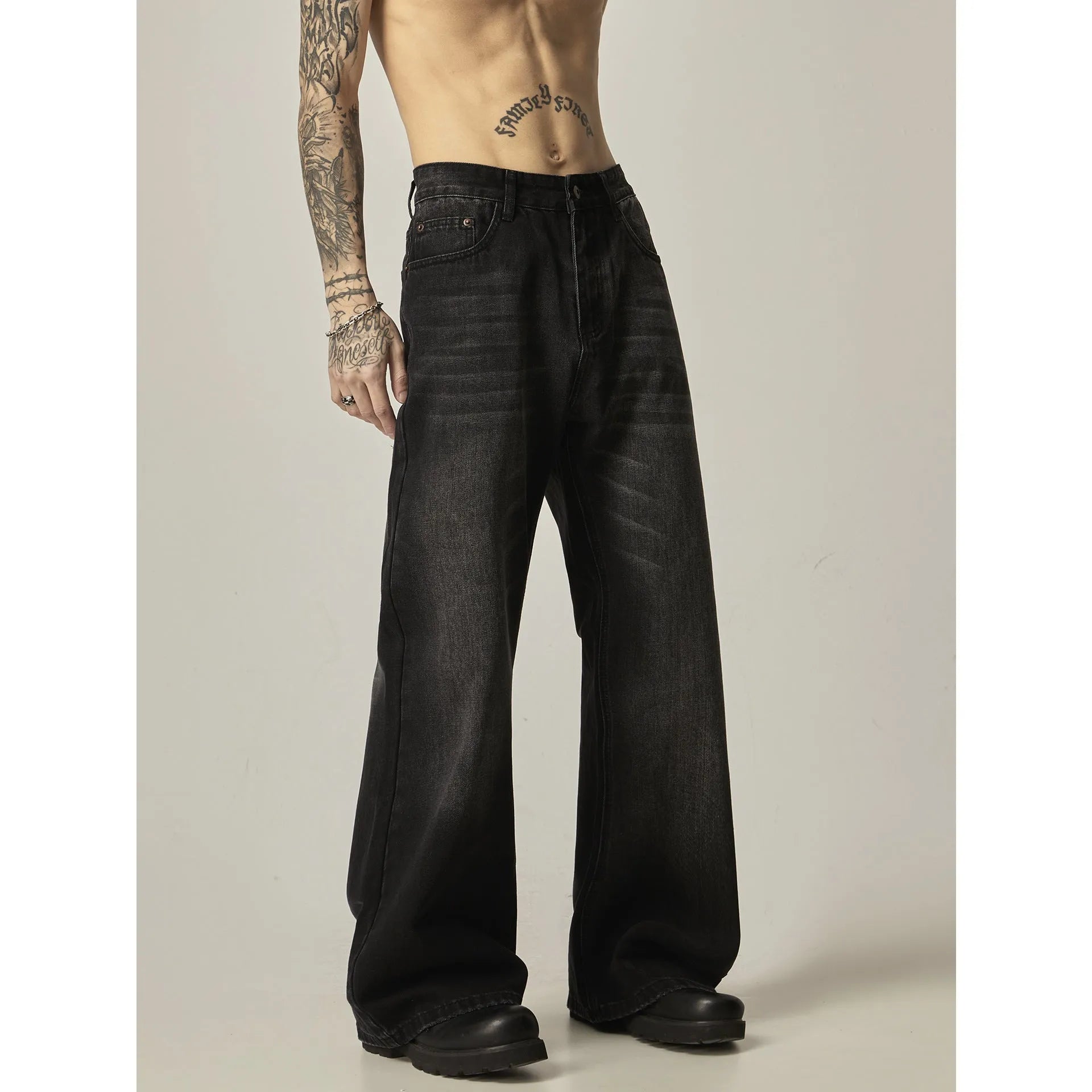 American retro black loose straight-leg jeans with zipper fly on mannequin