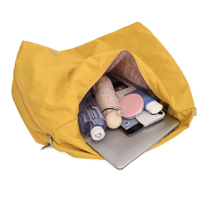 Women's heart-shaped nylon crossbody bag in black, blue, khaki or yellow with large capacity