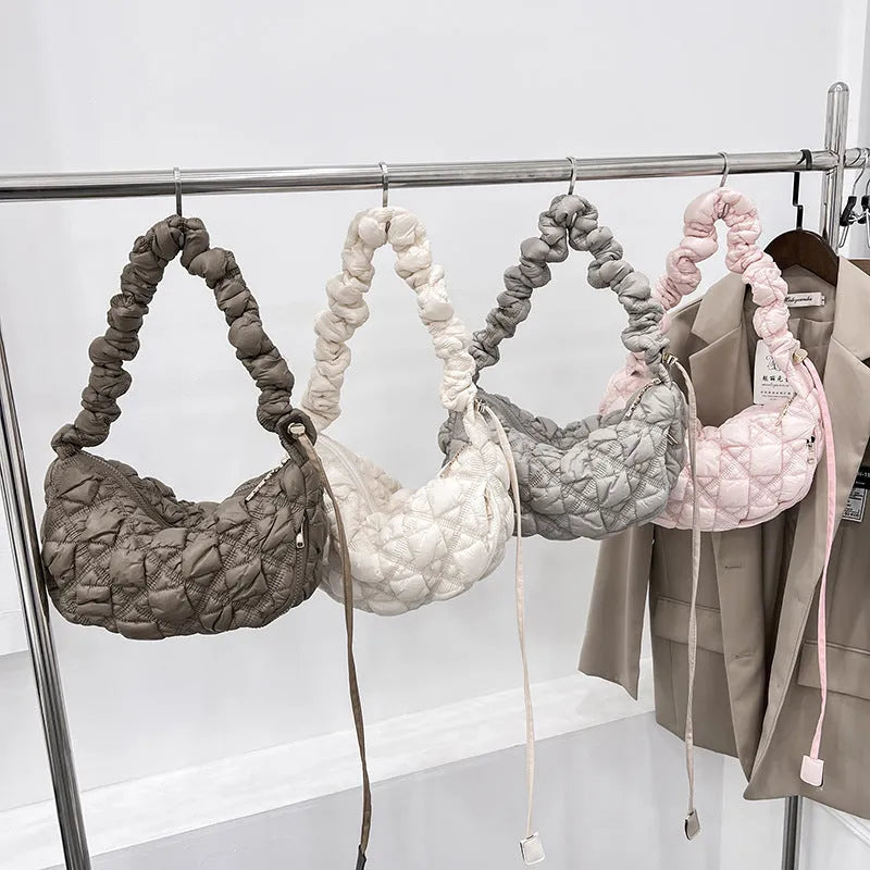 Women's nylon cloud underarm bag in beige colour with adjustable shoulder strap