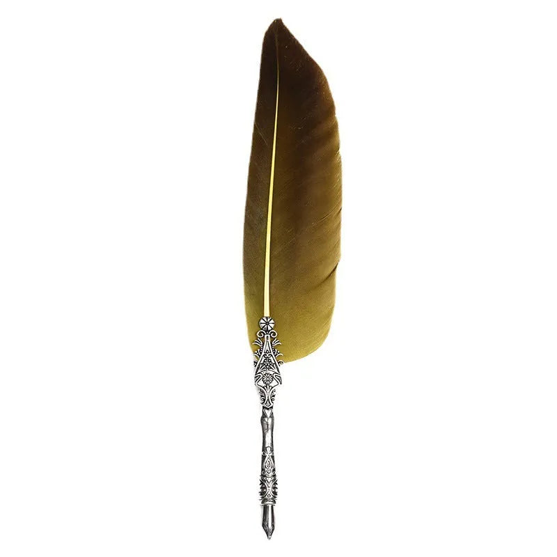 Vintage feather dip pen with zinc alloy shell in a choice of ten colours on a desk.