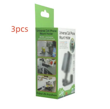 360 rotary collapsible mobile phone holder in black on a desk, with a phone propped up in landscape mode