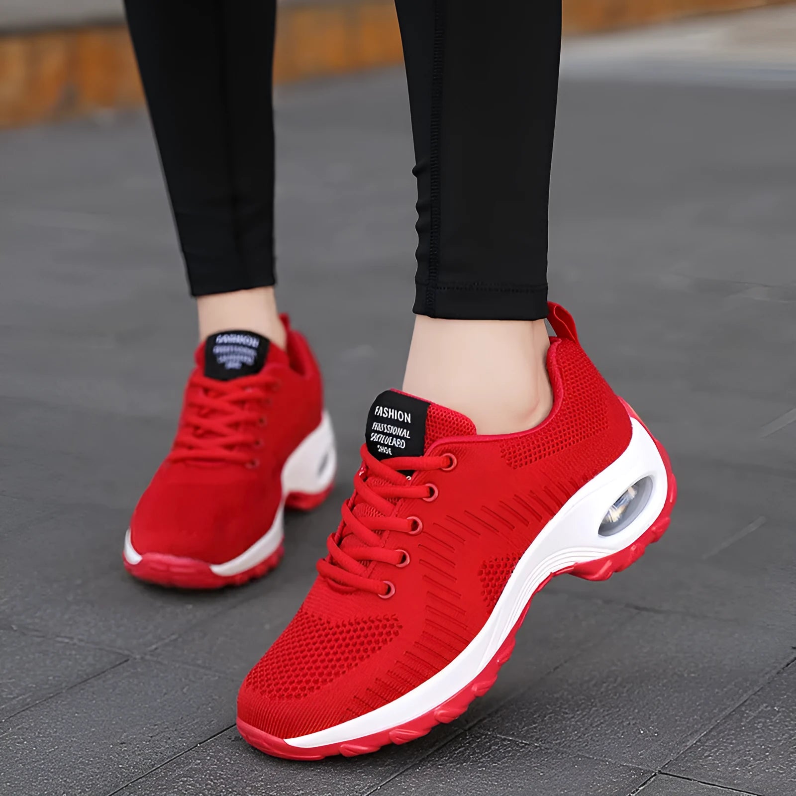 Women's red and black mesh sneakers with round toe and front lace-up design showing 3-5cm mid heel