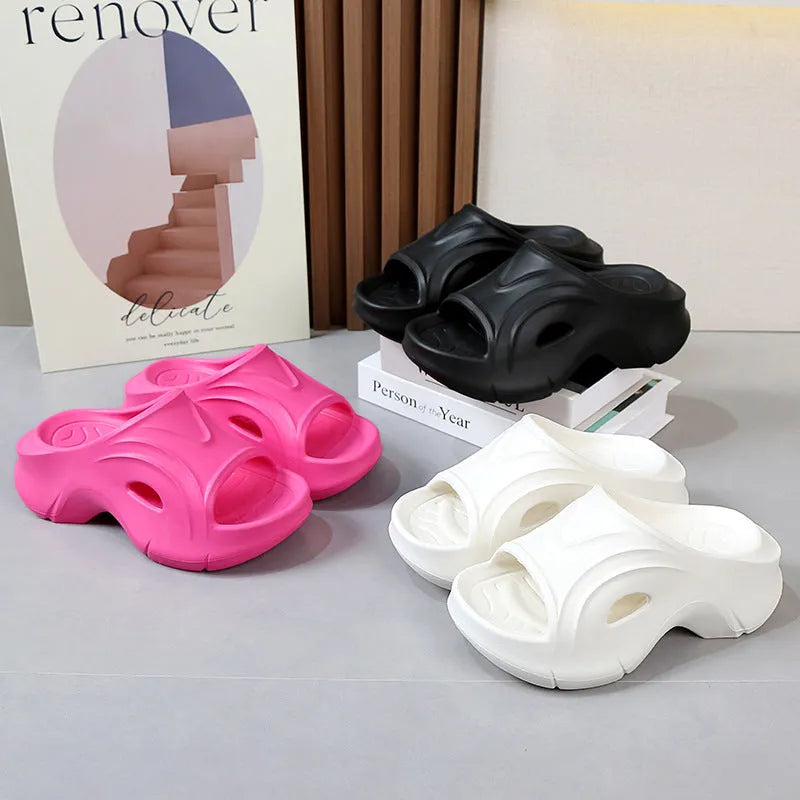 Women's thick-soled EVA slippers in rose red colour with round toe.