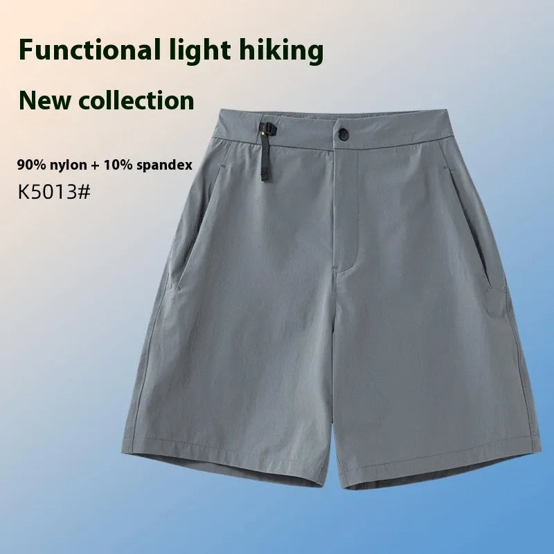 Men's solid colour quick-dry sports shorts with elastic waistband shown in Army Green