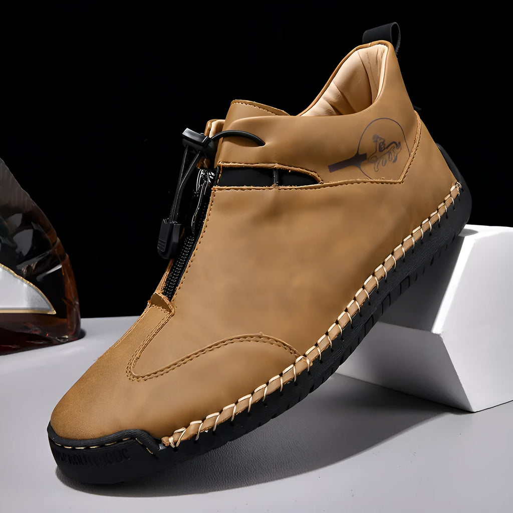 Men's black casual leather shoes with a round toe and mid-height rubber sole.