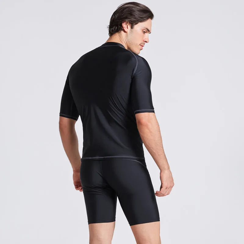 Men's quick-drying half sleeve swimsuit in blue with separate top and pants for snorkelling and surfing