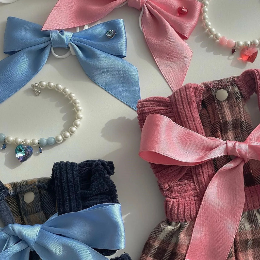 Adjustable princess style dog hair band with bow tension on small dog
