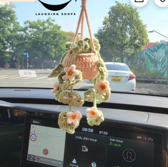 Green and white knitted wool car plant decoration with 25cm hanging rope on car dashboard