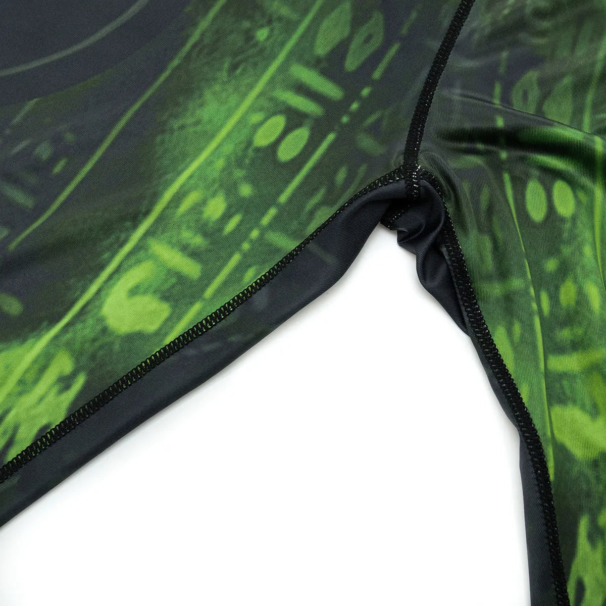 Man wearing a slim fit, long-sleeve ZF016 printed sports suit for running and fitness activities.